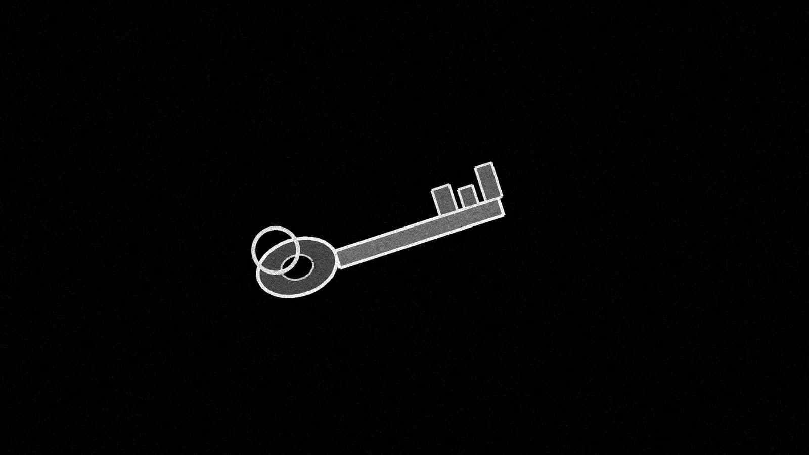 Illustration: a plain office key on a metal ring, three-quarter view on black.