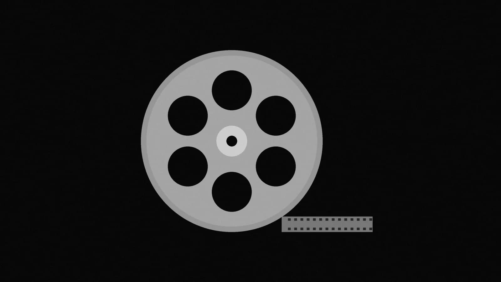 Illustration: a film reel seen face-on with round cutouts around its hub and a short strip of blank film trailing from its rim, in black and white.