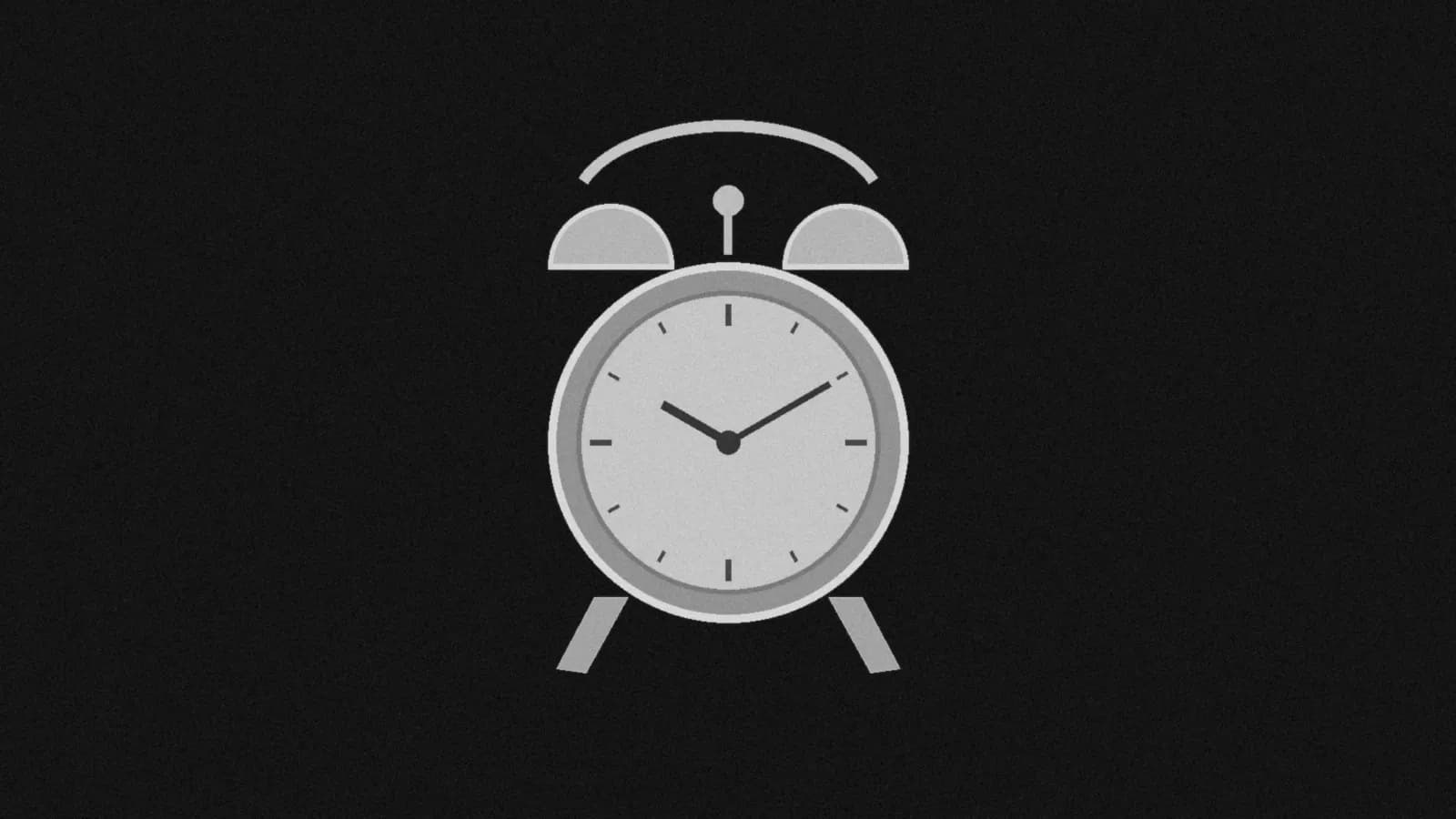 Illustration: a twin-bell alarm clock seen straight on, with a plain dial and two hands, on black.